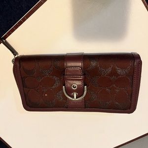 Burgundy signature Coach wallet